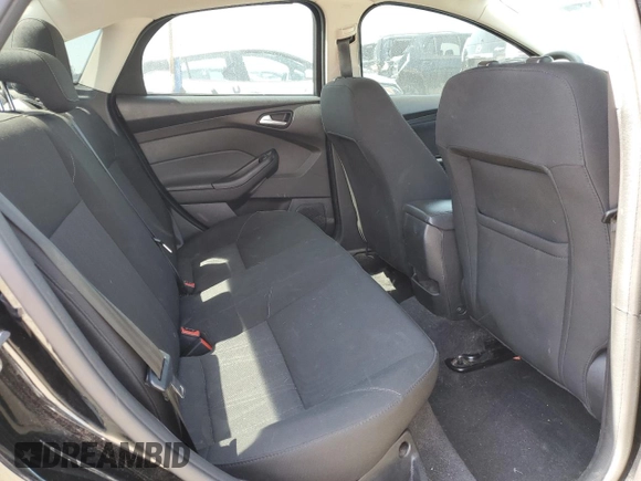 2018 Ford Focus SE z VIN 1FADP3FE0JL293485, wystawiony jako Copart lot #61202625 z przebiegiem 91 025 mil mil oraz Szkoda całkowita • Salvage title. Historia ofert i sprzedaży dostępna na DreamBid. Obrazek 10.