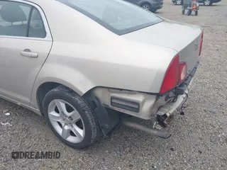 2011 Chevrolet Malibu 1LS with VIN 1G1ZB5E14BF326893, listed as a IAAI auction lot 42175943 with 163,887 mi miles and . Bid and sale history available at DreamBid. Image 14.