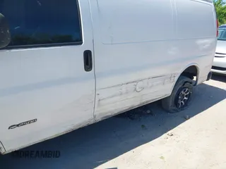 2004 Chevrolet Express Cargo Van with VIN 1GCGG25V441118708, listed as a IAAI auction lot 42144915 with 327,928 mi miles. Bid and sale history available at carsss.com. Image 6.