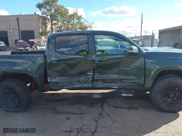 2021 Toyota Tacoma 4WD SR with VIN 3TMCZ5AN4MM401998, listed as a IAAI auction lot 41712813 with 91,371 mi miles. Bid and sale history available at carsss.com. Image 14.