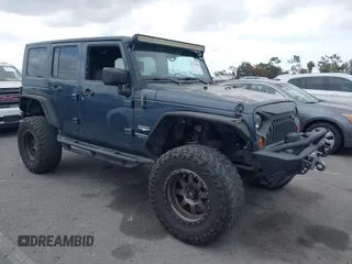 2008 Jeep Wrangler Unlimited Sahara with VIN 1J8GA59138L525836, listed as a IAAI auction lot 42116359 with 199,600 mi miles and . Bid and sale history available at DreamBid. Image 1.
