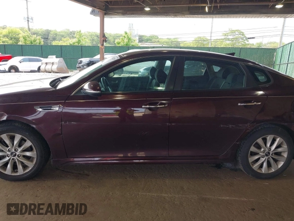 2016 Kia Optima LX with VIN 5XXGT4L32GG021055, listed as a IAAI auction lot 42424285 with 285,318 mi miles and . Bid and sale history available at DreamBid. Image 14.