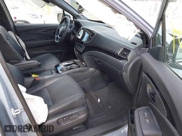 2023 Honda Passport Elite with VIN 5FNYF8H03PB000039, listed as a IAAI auction lot 40593339 with 33,697 mi miles and . Bid and sale history available at DreamBid. Image 5.