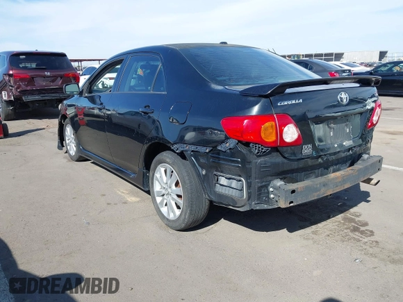 2010 Toyota Corolla with VIN 1NXBU4EE2AZ299148, listed as a IAAI auction lot 41884899 with 303,174 mi miles. Bid and sale history available at carsss.com. Image 3.