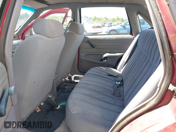 1993 Ford Tempo z VIN 1FAPP36X5PK141523, wystawiony jako IAAI lot #42042016 z przebiegiem 7 892 mil mil oraz . Historia ofert i sprzedaży dostępna na DreamBid. Obrazek 8.