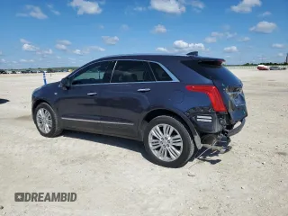 2018 Cadillac XT5 Premium Luxury FWD z VIN 1GYKNERS3JZ133029, wystawiony jako Copart lot #55932695 z przebiegiem 93 098 mil mil oraz Szkoda całkowita • Salvage title. Historia ofert i sprzedaży dostępna na DreamBid. Obrazek 2.