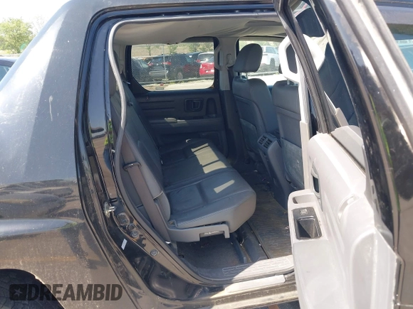 2008 Honda Ridgeline RTL with VIN 2HJYK16588H519676, listed as a IAAI auction lot 42561015 with 122,344 mi miles and . Bid and sale history available at DreamBid. Image 8.