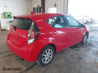 2015 Toyota Prius c One with VIN JTDKDTB3XF1108456, listed as a IAAI auction lot 41743379 with 132,265 mi miles. Bid and sale history available at carsss.com. Image 4.