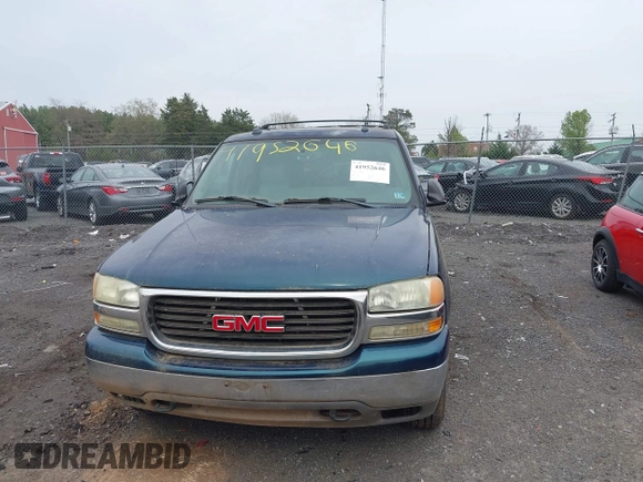 2005 GMC Yukon SLT with VIN 1GKEK13T15R196436, listed as a IAAI auction lot 41952646 with 247,487 mi miles. Bid and sale history available at carsss.com. Image 6.