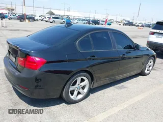2013 BMW 3 Series 328i with VIN WBA3C1C50DF435120, listed as a IAAI auction lot 42132086 with 137,588 mi miles and . Bid and sale history available at carsss.com. Image 4.