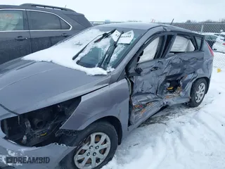 2014 Hyundai Accent GS with VIN KMHCT5AE1EU194495, listed as a IAAI auction lot 41609591 with 85,737 mi miles. Bid and sale history available at carsss.com. Image 6.