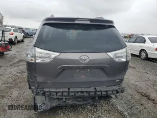 2014 Toyota Sienna SE with VIN 5TDXK3DC3ES470042, listed as a Copart auction lot 49254335 with 99,208 mi miles and Salvage Title. Bid and sale history available at DreamBid. Image 6.