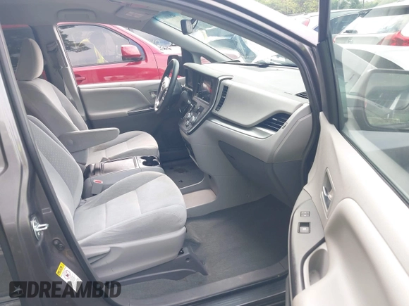 2015 Toyota Sienna LE AAS with VIN 5TDKK3DC8FS632906, listed as a IAAI auction lot 42533867 with 128,980 mi miles and . Bid and sale history available at DreamBid. Image 5.