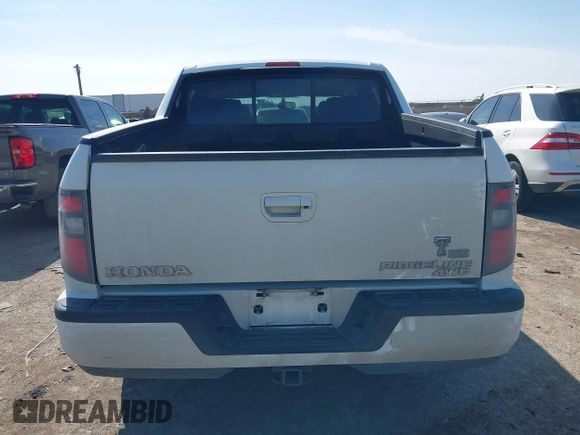 2014 Honda Ridgeline Sport with VIN 5FPYK1F78EB011254, listed as a IAAI auction lot 41564771 with 151,741 mi miles and . Bid and sale history available at DreamBid. Image 17.