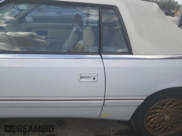 1994 Chrysler LeBaron z VIN 1C3EU4530RF259672, wystawiony jako Copart lot #80346444 z przebiegiem Nie podano mil oraz Szkody całkowita. Historia ofert i sprzedaży dostępna na DreamBid. Obrazek 12.