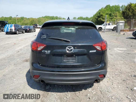 2015 Mazda CX-5 Touring with VIN JM3KE4CY6F0434538, listed as a Copart auction lot 54966145 with 209,447 mi miles and Clean Title. Bid and sale history available at DreamBid. Image 6.