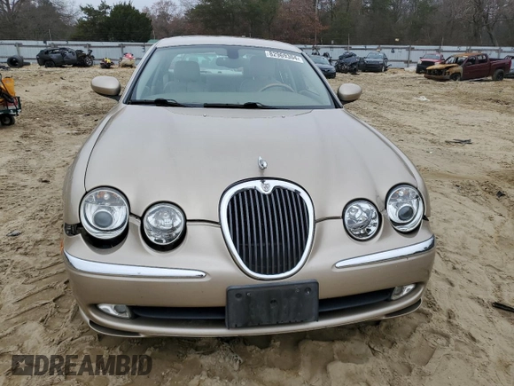 2003 Jaguar S-Type z VIN SAJEA01U33HM71782, wystawiony jako Copart lot #82969304 z przebiegiem 127 176 mil mil oraz Szkody całkowita. Historia ofert i sprzedaży dostępna na DreamBid. Obrazek 5.