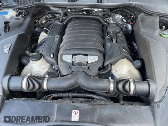 2011 Porsche Cayenne S with VIN WP1AB2A22BLA47332, listed as a Copart auction lot 65087385 with 112,033 mi miles and Salvage title. Bid and sale history available at DreamBid. Image 7.