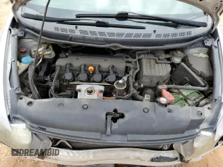 2009 Honda Civic LX z VIN 2HGFA16599H301893, wystawiony jako Copart lot #58815225 z przebiegiem 174 952 mil mil oraz Szkoda całkowita • Salvage title. Historia ofert i sprzedaży dostępna na DreamBid. Obrazek 11.