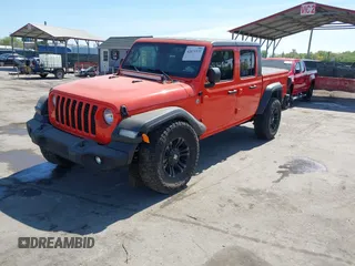2020 Jeep Gladiator Sport S z VIN 1C6HJTAG0LL149161, wystawiony jako IAAI lot #42071132 z przebiegiem 153 062 mil mil oraz . Historia ofert i sprzedaży dostępna na DreamBid. Obrazek 19.