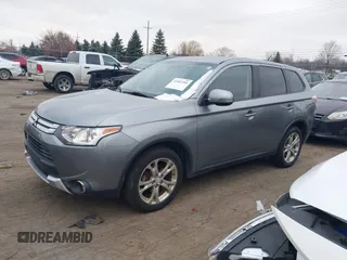 2015 Mitsubishi Outlander SE with VIN JA4AZ3A39FZ007936, listed as a IAAI auction lot 41003206 with 136,017 mi miles and . Bid and sale history available at DreamBid. Image 17.