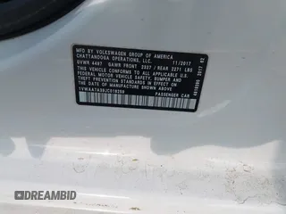 2018 Volkswagen Passat S z VIN 1VWAA7A39JC016259, wystawiony jako IAAI lot #42382550 z przebiegiem 89 143 mil mil oraz . Historia ofert i sprzedaży dostępna na DreamBid. Obrazek 9.