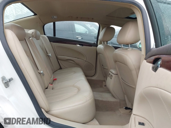 2009 Buick Lucerne CXL with VIN 1G4HD57M19U147653, listed as a IAAI auction lot 42166780 with 84,794 mi miles and . Bid and sale history available at DreamBid. Image 8.