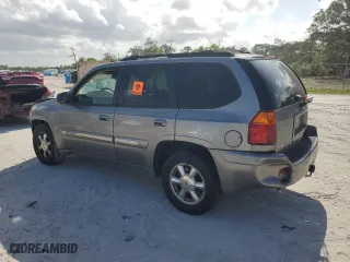 2005 GMC Envoy SLE with VIN 1GKDS13S752277744, listed as a Copart auction lot 51236965 with 248,950 mi miles and Salvage Title. Bid and sale history available at carsss.com. Image 2.