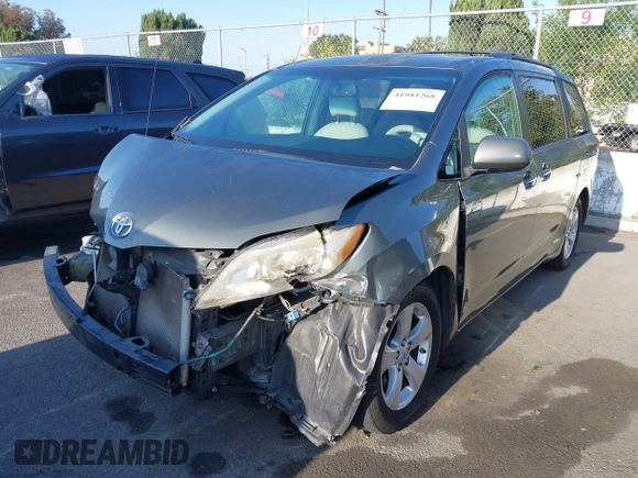 2013 Toyota Sienna LE AAS with VIN 5TDKK3DC0DS313786, listed as a IAAI auction lot 41981268 with 162,423 mi miles. Bid and sale history available at carsss.com. Image 2.