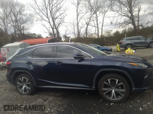 2017 Lexus RX with VIN 2T2ZZMCA4HC060546, listed as a IAAI auction lot 41734868 with 119,000 mi miles. Bid and sale history available at carsss.com. Image 13.