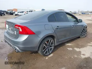 2017 Volvo S60 Dynamic with VIN YV126MFL4H2430687, listed as a IAAI auction lot 41577059 with 57,027 mi miles. Bid and sale history available at carsss.com. Image 4.