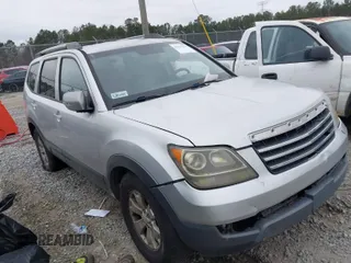 2009 Kia Borrego LX with VIN KNDJJ741395023592, listed as a IAAI auction lot 41554393 with 428,680 mi miles. Bid and sale history available at carsss.com. Image 1.