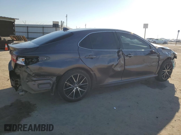 2023 Toyota Camry SE with VIN 4T1G11AK8PU732604, listed as a Copart auction lot 50635685 with 57,364 mi miles and Salvage Title. Bid and sale history available at DreamBid. Image 3.