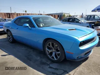 2015 Dodge Challenger SXT Plus with VIN 2C3CDZBG5FH835505, listed as a Copart auction lot 51276635 with 58,437 mi miles and Salvage title. Bid and sale history available at DreamBid. Image 4.