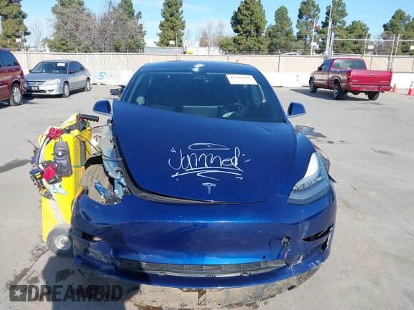 2018 Tesla Model 3 Long Range Battery with VIN 5YJ3E1EA4JF011799, listed as a IAAI auction lot 41765860 with 133,098 mi miles. Bid and sale history available at carsss.com. Image 12.