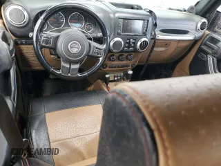 2012 Jeep Wrangler Unlimited Rubicon с VIN 1C4HJWFG4CL103531, выставлен на аукционе Copart как лот 48131665 с пробегом 183 234 миль миль и Списание • Salvage title. История ставок и продаж доступна на DreamBid. Изображение 8.