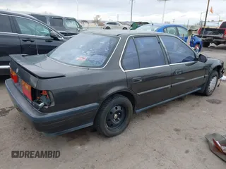 1991 Honda Accord LX with VIN JHMCB7653MC090847, listed as a IAAI auction lot 41561641 with 163,258 mi miles. Bid and sale history available at carsss.com. Image 4.