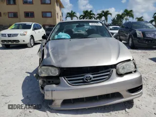 2001 Toyota Corolla CE с VIN 1NXBR12E81Z419653, выставлен на аукционе Copart как лот 60854625 с пробегом Не указан миль и Списание • Salvage title. История ставок и продаж доступна на DreamBid. Изображение 5.