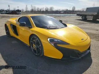 2016 McLaren 650S with VIN SBM11FAA6GW006251, listed as a Copart auction lot 52177065 with 14,614 mi miles and Clean Title. Bid and sale history available at DreamBid. Image 4.