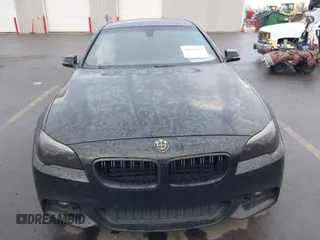 2015 BMW 5 Series 535i with VIN WBA5B1C51FG125924, listed as a IAAI auction lot 41060431 with 102,957 mi miles and . Bid and sale history available at carsss.com. Image 12.