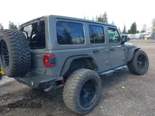 2021 Jeep Wrangler Unlimited Rubicon with VIN 1C4HJXFG9MW531858, listed as a IAAI auction lot 42001095 with 38,240 mi miles and . Bid and sale history available at DreamBid. Image 4.