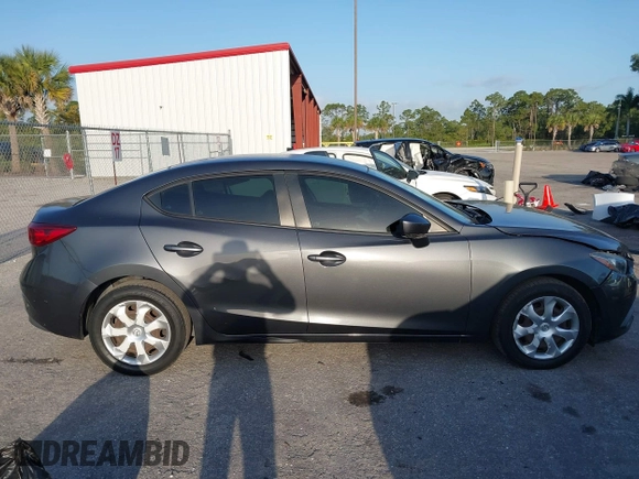 2016 Mazda 3 i Sport with VIN 3MZBM1T70GM305353, listed as a IAAI auction lot 42101846 with 103,791 mi miles and . Bid and sale history available at carsss.com. Image 13.