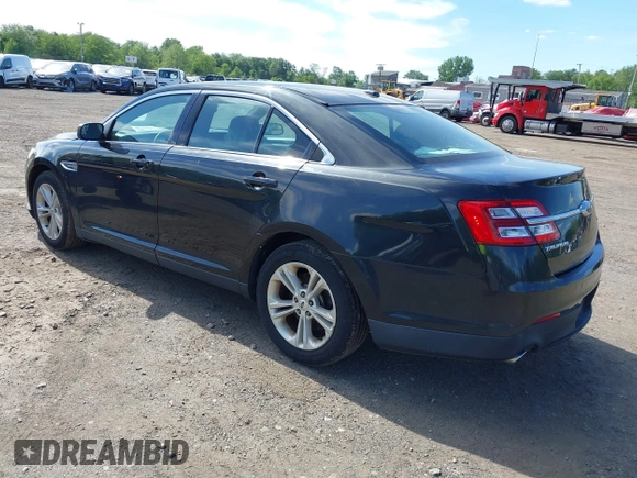 2015 Ford Taurus SEL with VIN 1FAHP2E88FG181055, listed as a IAAI auction lot 42307640 with 104,702 mi miles and . Bid and sale history available at DreamBid. Image 3.