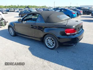 2011 BMW 1 Series 128i with VIN WBAUL7C55BVM81049, listed as a IAAI auction lot 41892811 with 50,659 mi miles and . Bid and sale history available at carsss.com. Image 3.