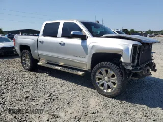 2018 Chevrolet Silverado 1500 LT with VIN 3GCUKREC6JG167804, listed as a Copart auction lot 52859235 with 124,822 mi miles and Salvage Title. Bid and sale history available at DreamBid. Image 4.