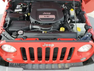 2018 Jeep Wrangler JK Unlimited Sport S with VIN 1C4BJWDG2JL897547, listed as a Copart auction lot 85795624 with 52,650 mi miles and Non Repairable. Bid and sale history available at carsss.com. Image 12.