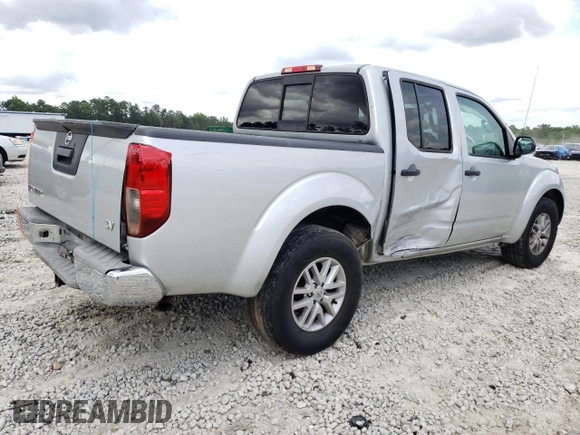 2016 Nissan Frontier S with VIN 1N6AD0ER2GN792209, listed as a Copart auction lot 60036045 with 162,516 mi miles and Salvage title. Bid and sale history available at DreamBid. Image 3.
