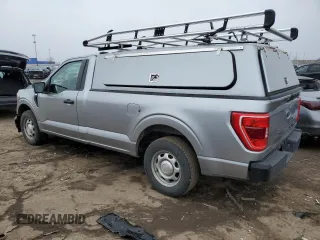 2022 Ford F-150 XL with VIN 1FTMF1C56NKD25163, listed as a Copart auction lot 48294315 with 104,625 mi miles and Clean title. Bid and sale history available at DreamBid. Image 2.