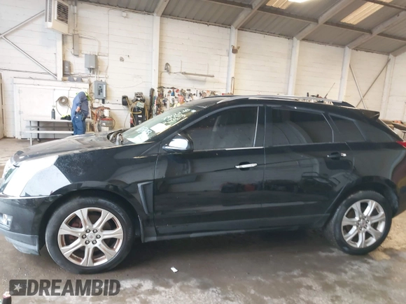 2014 Cadillac SRX Performance Collection with VIN 3GYFNFE39ES659013, listed as a IAAI auction lot 42264069 with 129,122 mi miles and . Bid and sale history available at DreamBid. Image 14.