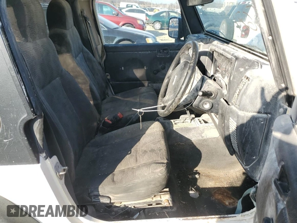 2004 Jeep Wrangler Sport Right Hand Drive with VIN 1J4F449S54P775671, listed as a Copart auction lot 85610114 with 199,074 mi miles and Salvage Title. Bid and sale history available at carsss.com. Image 7.